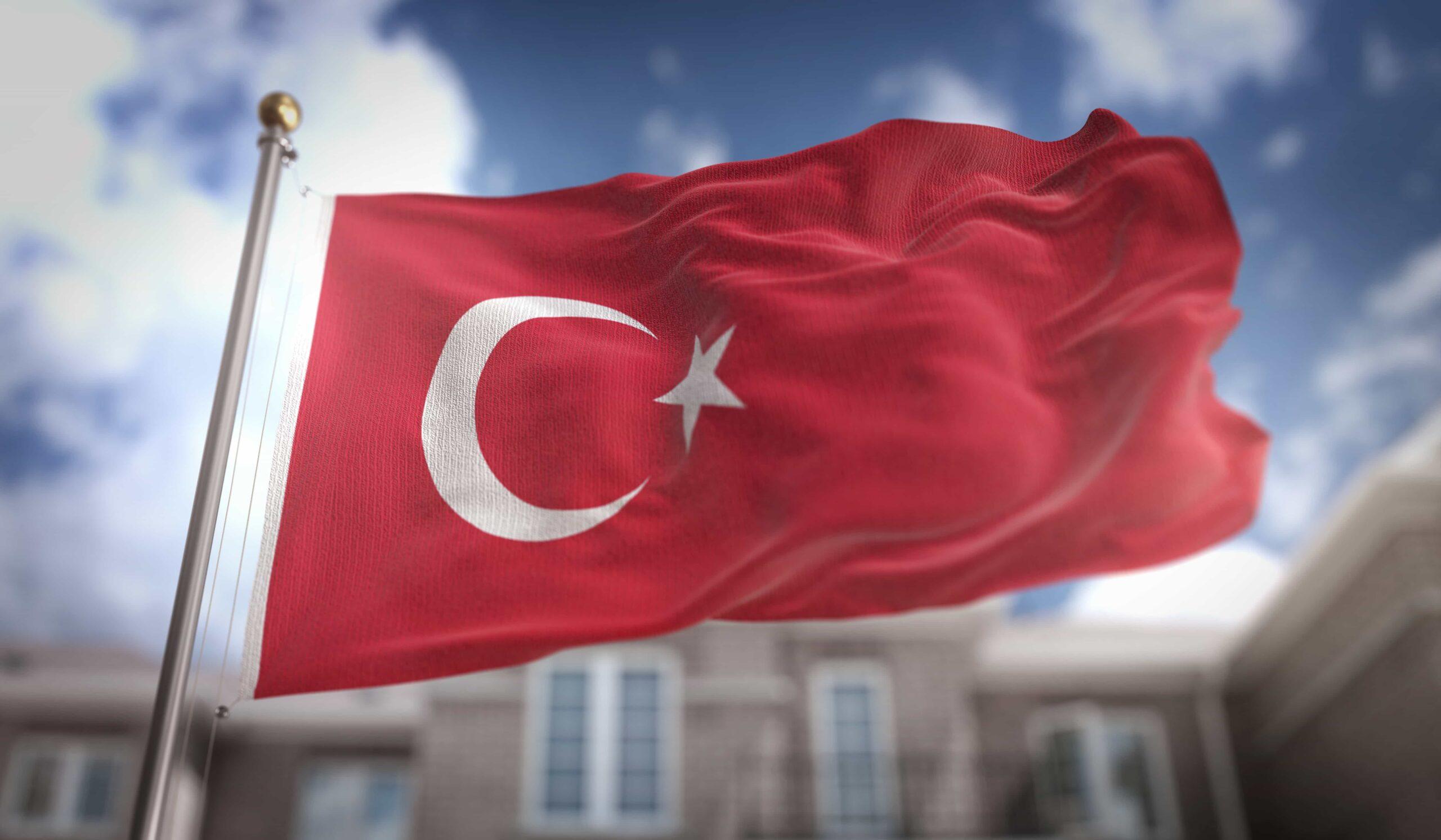 turkey-flag-3d-rendering-blue-sky-building-background